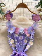 Floral embroidered tie waist mini dress by Trendsi featuring a summery A-line silhouette and elegant floral embroidery.