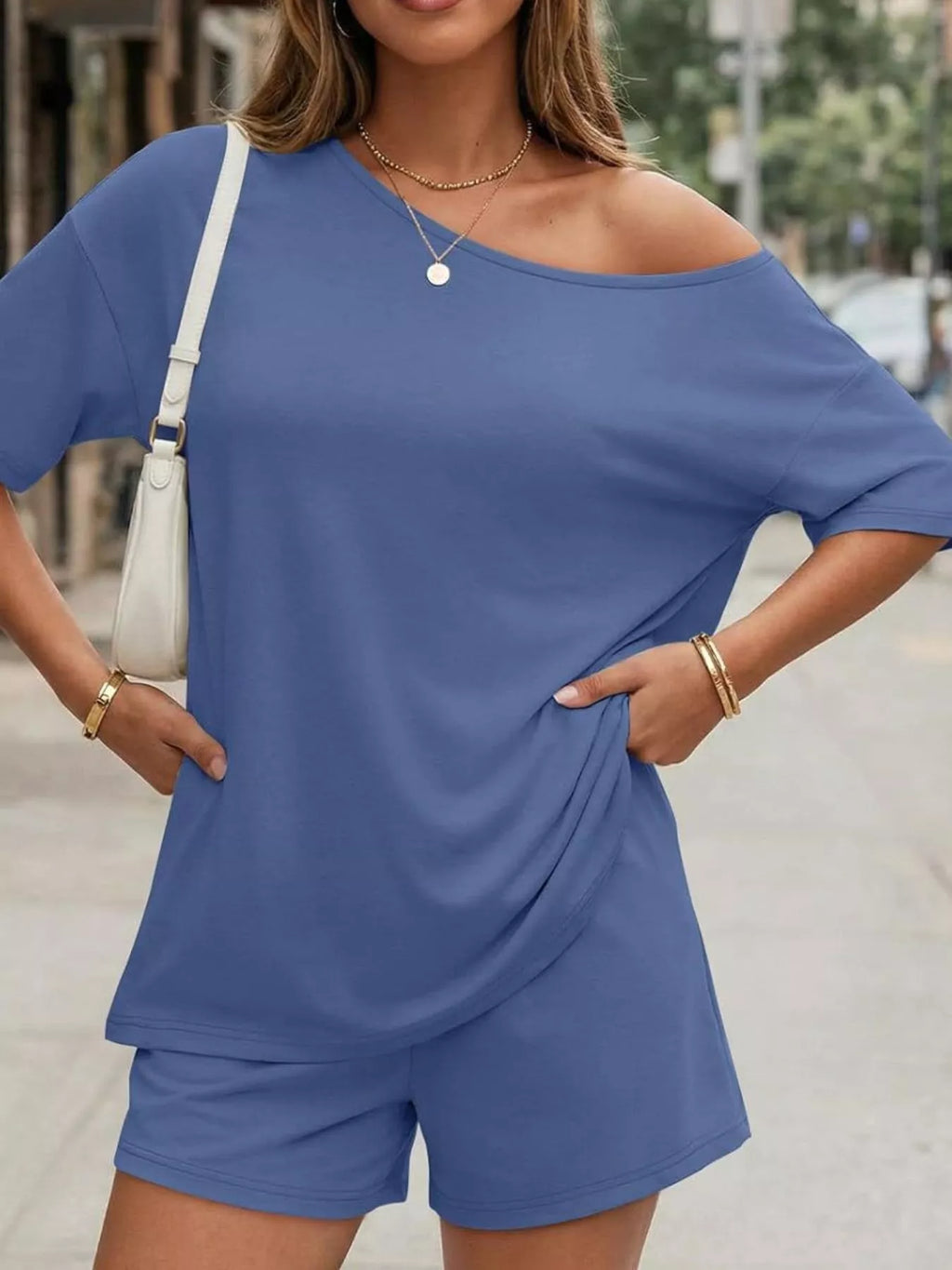 Plus size Trendsi one-shoulder top and shorts set, featuring a stylish, coordinated look with a full-size fit and modern design.