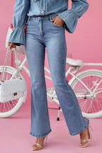 Trendsi bootcut jeans with front and back pockets, classic denim style, and a relaxed fit, shown on a model.