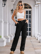 High-waisted cargo denim jeans from Plush Fashion Shop featuring multiple pockets and a relaxed fit.