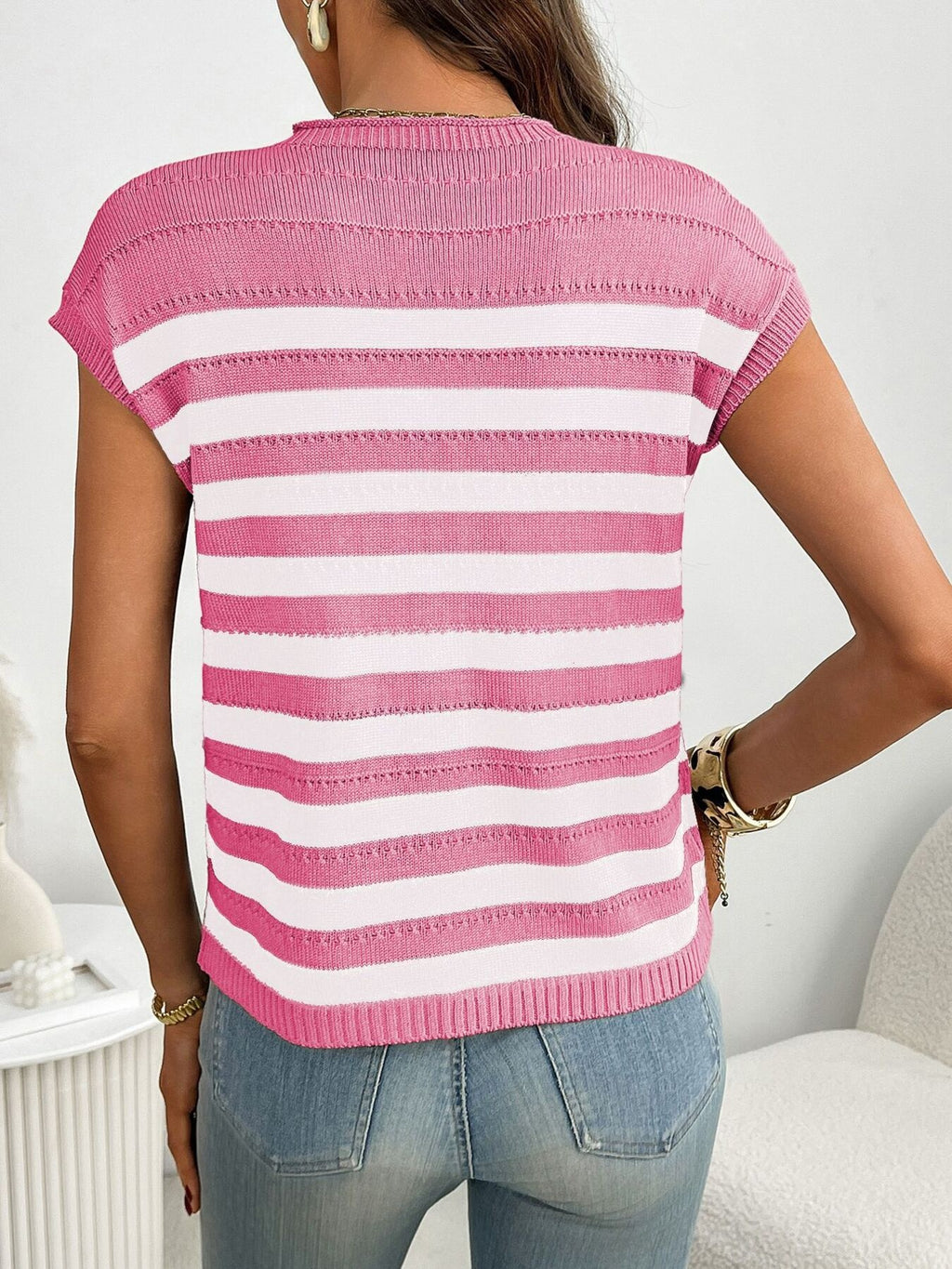 Women's striped knit cap sleeve sweater with pocket detail, stylish and casual Trendsi fashion piece.
