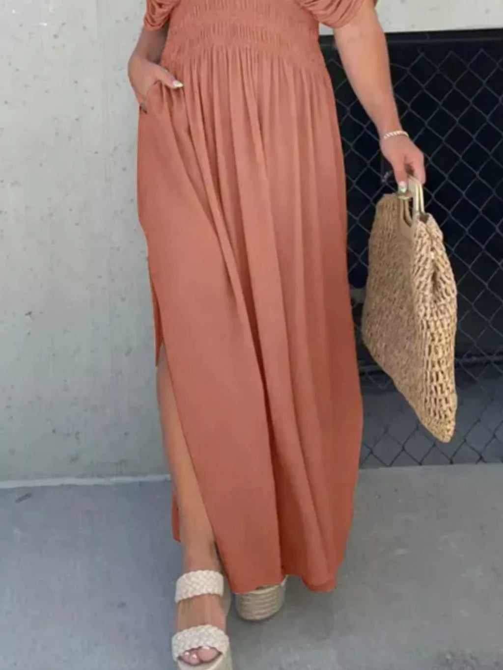 Plus size Trendsi maxi dress with slit V-neck, smocked waist, and flowing fabric, ideal for elegant summer or evening wear.