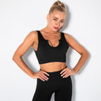 Seamless ribbed built-in bra tank top for women, longline workout crop top, plush fabric, perfect for activewear and exercise.
