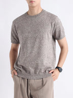 Men's plus size casual knitted short sleeve T-shirt from Trendsi, featuring a comfortable, stylish design in a relaxed fit.