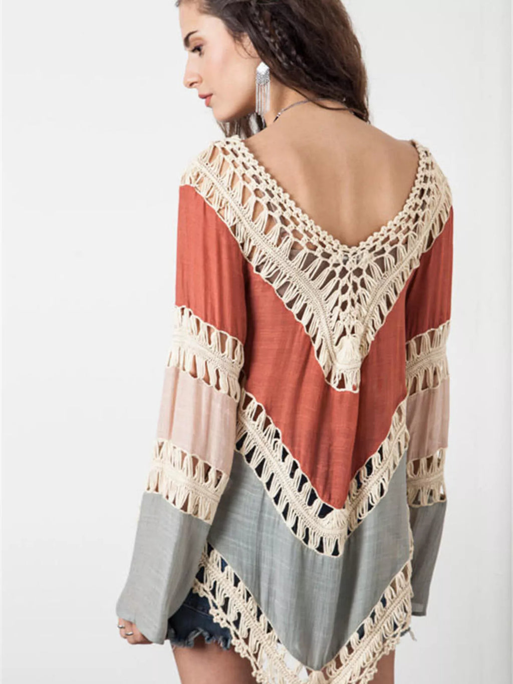 Crochet trimmed long sleeve cover-up from Trendsi featuring lightweight fabric, intricate crochet details, and a relaxed fit.