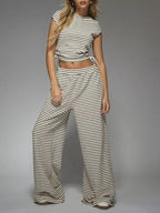 Striped crop top and wide-leg pants set by Trendsi, casual dress with stylish horizontal stripe pattern and relaxed fit.