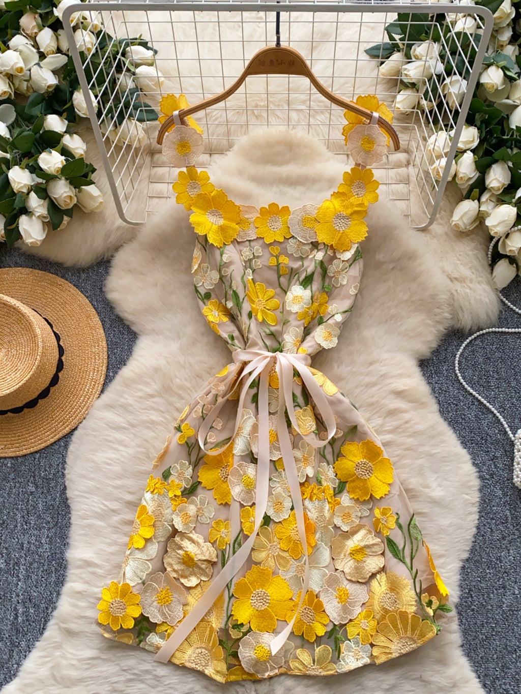 Floral embroidered tie waist mini dress by Trendsi featuring an elegant summer A-line design with floral embroidery and a flattering fit.