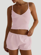 Trendsi V-neck cami and shorts activewear set, lightweight fabric, fitted top with matching shorts for comfortable workout or casual wear.