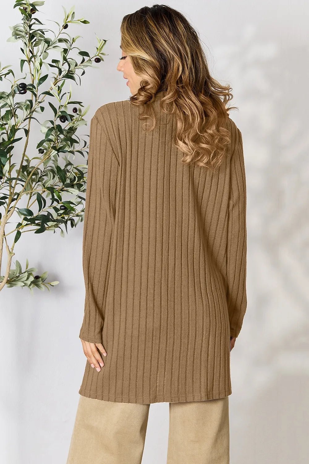 Women's lightweight ribbed open front cardigan with functional pockets, stylish and comfortable for layered outfits.