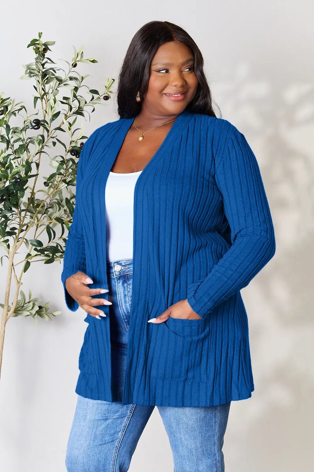 Women's ribbed open front cardigan with functional pockets, lightweight and cozy, perfect for layered casual wear.