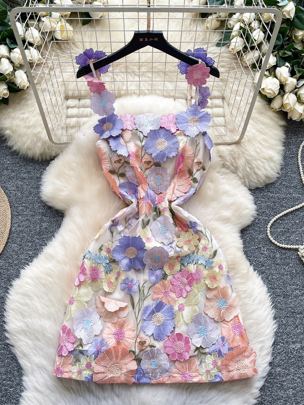 Floral embroidered tie waist mini dress by Trendsi, elegant summer A-line dress with floral embroidery and flattering silhouette.