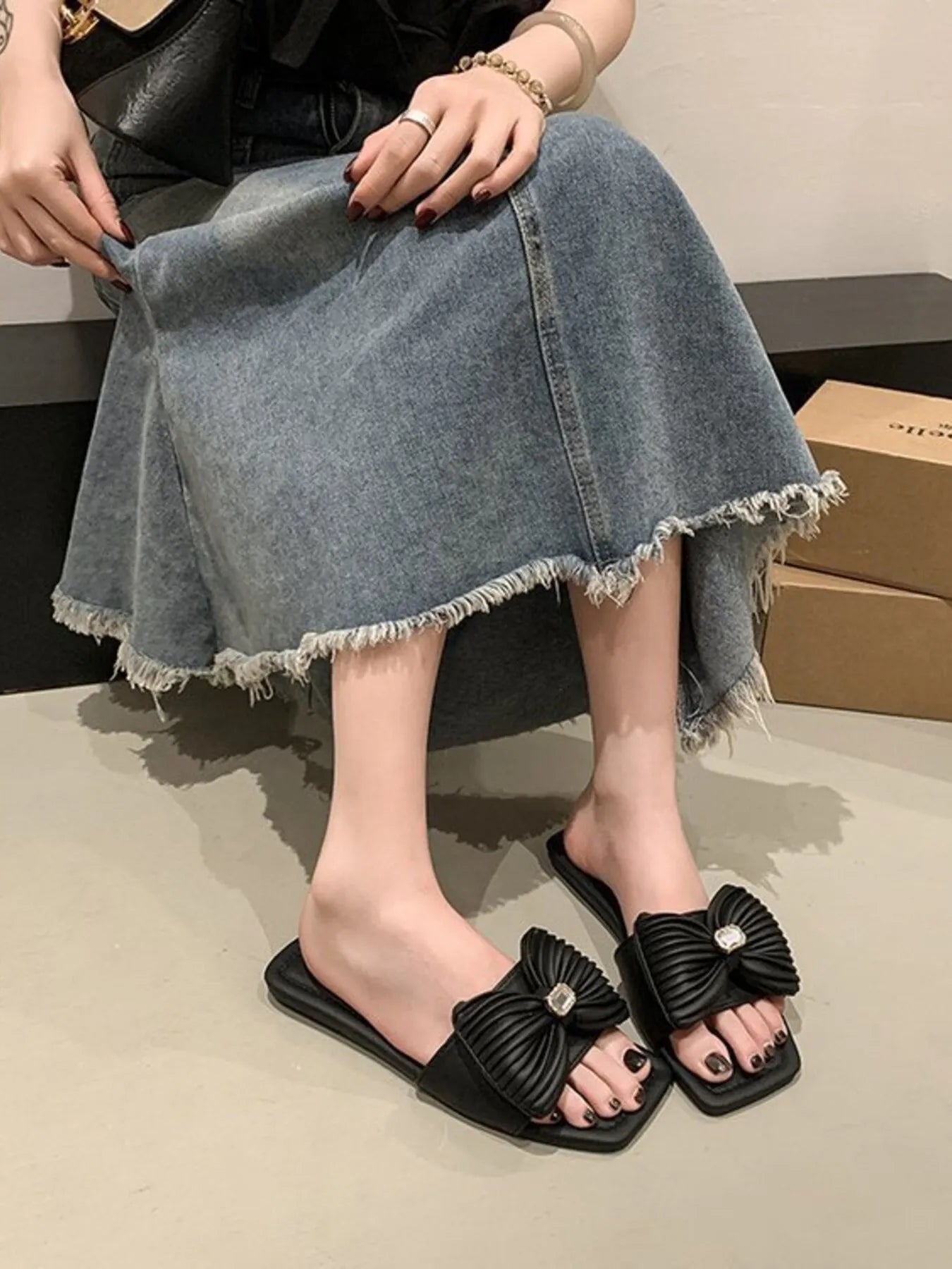 Women's elegant bow-knot faux leather flat sandals with open toes and ankle straps, stylish and comfortable for summer wear.