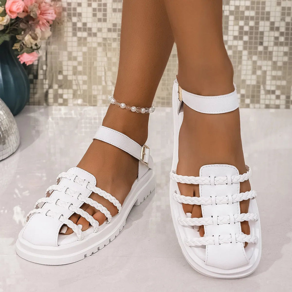 Women's braided ankle strap low heel sandals by Trendsi, featuring comfortable chic design with stylish braided details and ankle strap.