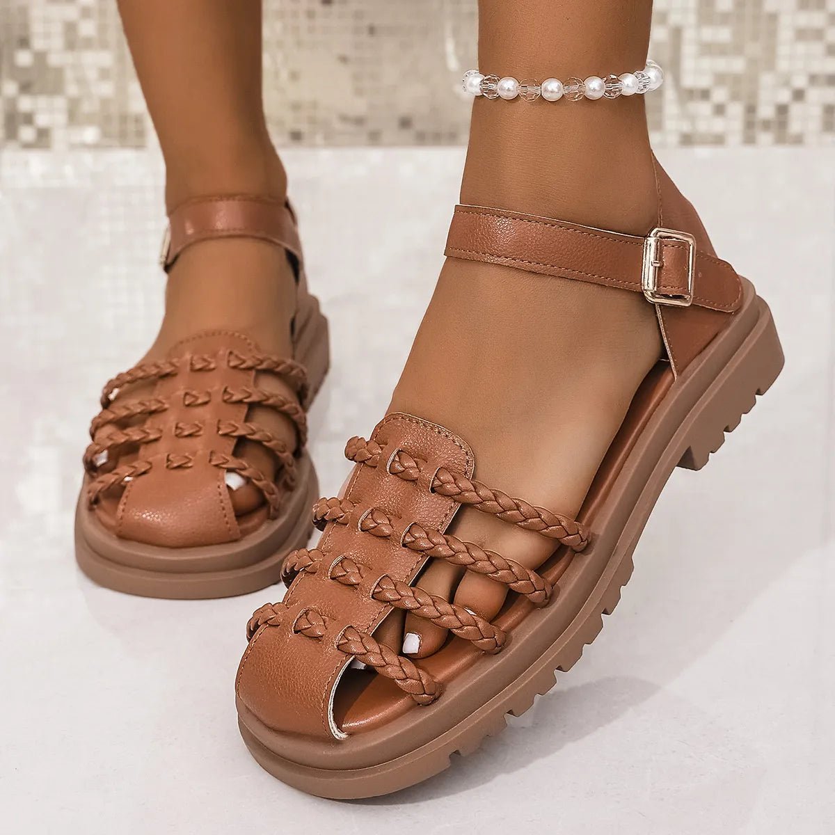 Women's braided ankle strap low heel sandals by Trendsi, showcasing stylish beige footwear with woven straps and comfortable design.