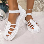 Women's braided ankle strap low heel sandals by Trendsi, stylish footwear with woven design and comfortable chic style.