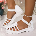 Women's braided ankle strap low heel sandals by Trendsi, featuring comfortable chic footwear design and stylish ankle straps.