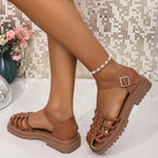 Women's braided ankle strap low heel sandals by Trendsi, featuring stylish woven straps and comfortable chic footwear design.