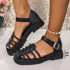Women's braided ankle strap low heel sandals by Trendsi featuring stylish design and comfortable fit, perfect for casual or dressy occasions.