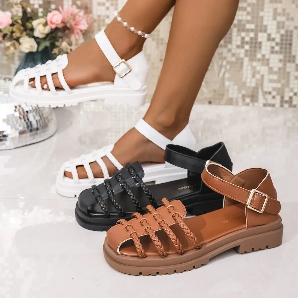 Women's braided ankle strap low heel sandals by Trendsi, featuring stylish woven straps and comfortable chic footwear design.