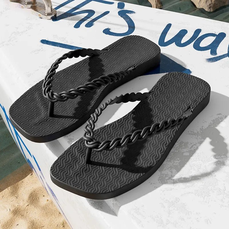 Women's braided strap beach sandals with toe post, comfortable summer flip flops by Trendsi, ideal for casual beach wear.