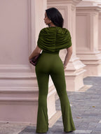 Trendsi ruched flare-leg jumpsuit with fitted bodice and wide leg design, shown in black fabric on a model.