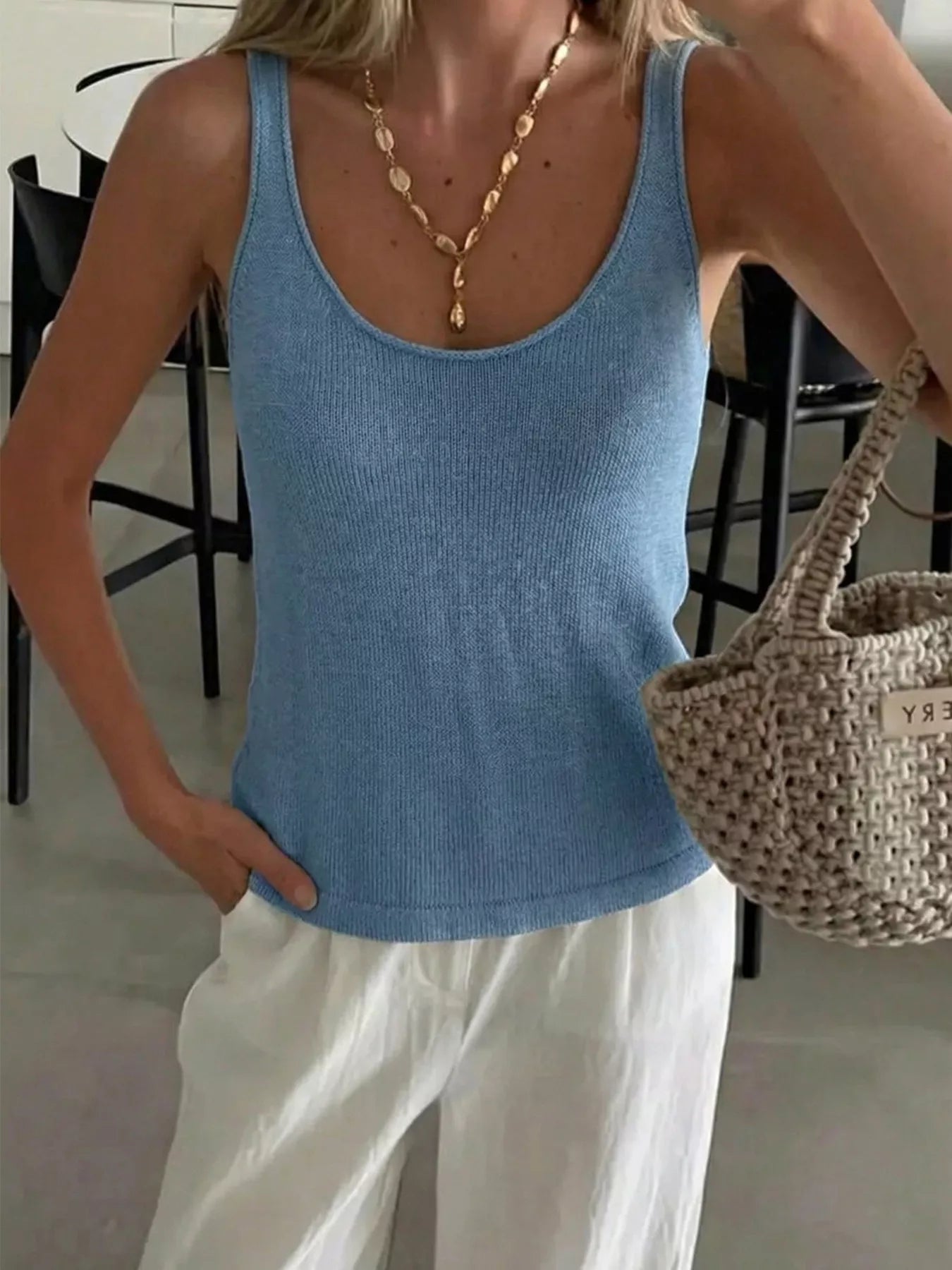 Trendsi scoop neck knit tank top in soft fabric, close-up view showing the smooth, fitted design and textured knit pattern.