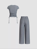 Striped crop top and wide-leg pants set by Trendsi, casual dress featuring bold horizontal stripes and relaxed fit.