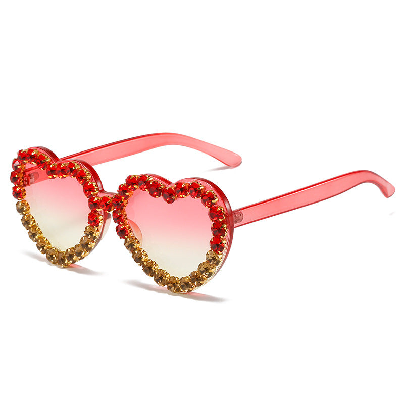 Peach heart-shaped rhinestone sunglasses by FitiqueFit in Y2K INS style, featuring sparkly rhinestones and trendy eyeWear design.