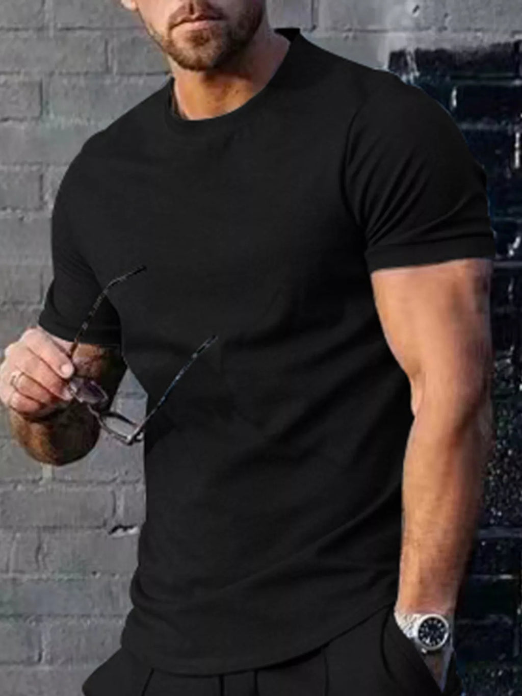 Men's plus size casual T-shirt by Trendsi in solid color, featuring a classic crew neck and comfortable fit.
