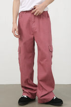 Men's mid-rise jeans with cargo pockets, stylish denim from Trendsi, featuring a classic fit and functional side pockets.