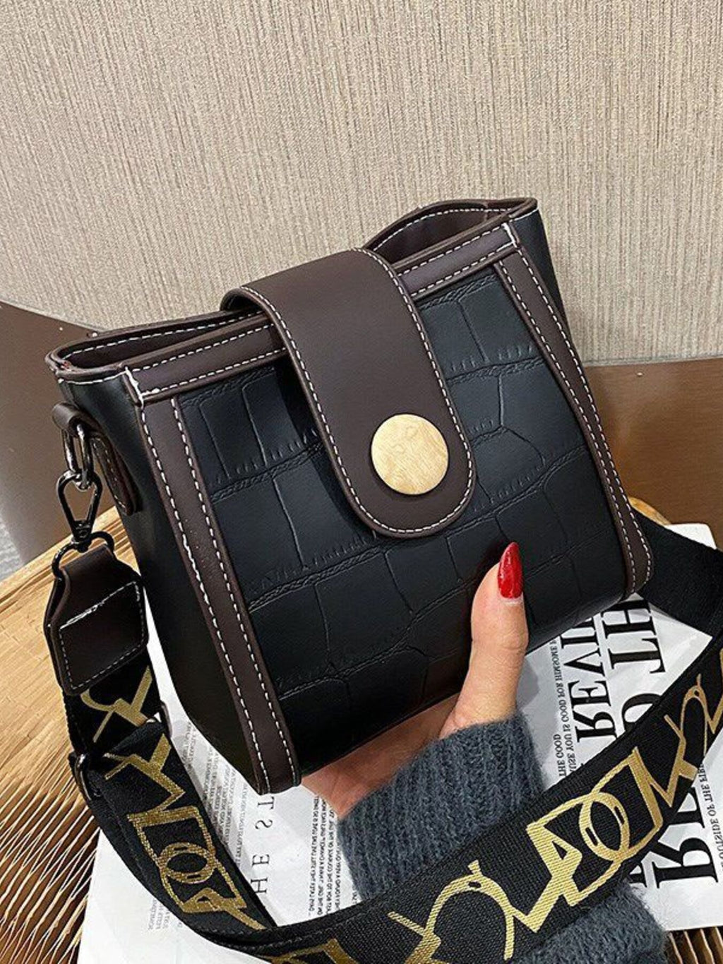 Crocodile embossed wide strap crossbody bag in premium PU leather, featuring a sleek design and adjustable strap.