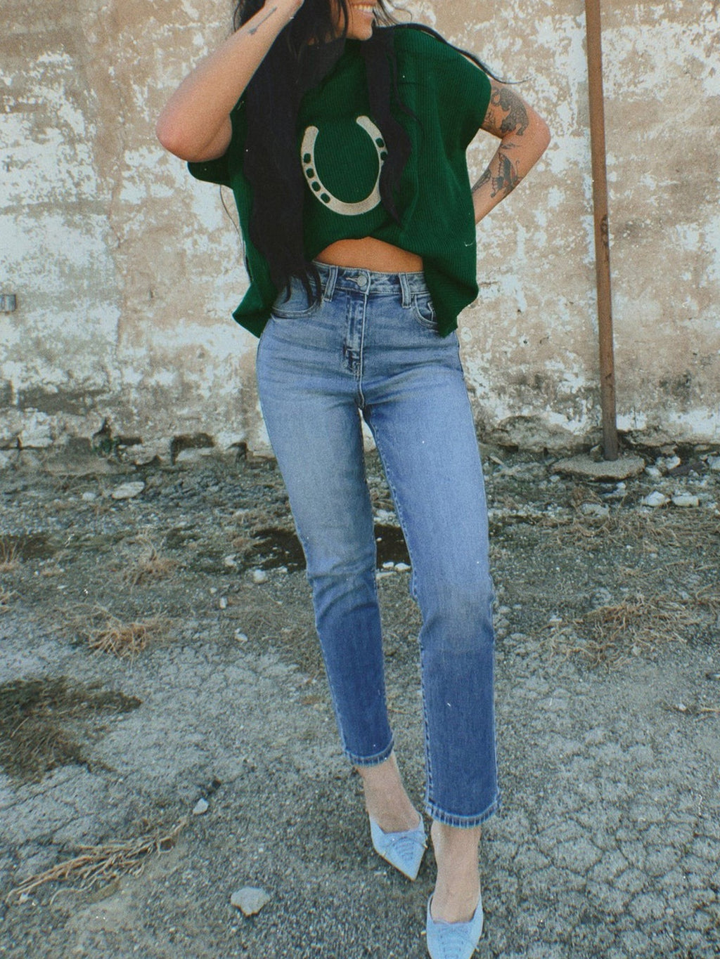 Women’s horseshoe graphic ribbed knit short sleeve sweater by Trendsi, featuring a close-up of the design and textured fabric.