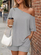 Plus size Trendsi one-shoulder top and shorts set, featuring a stylish full-size design and casual, trendy fit.