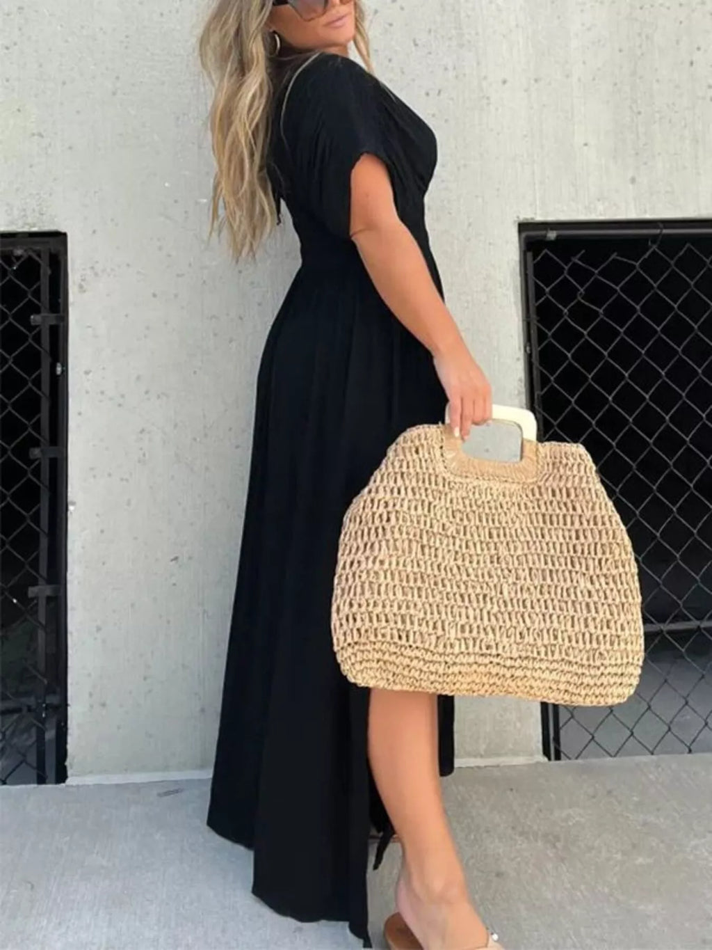 Plus size maxi dress with slit V-neck, smocked waist, and flowing fabric, by Trendsi, perfect for elegant summer wear.