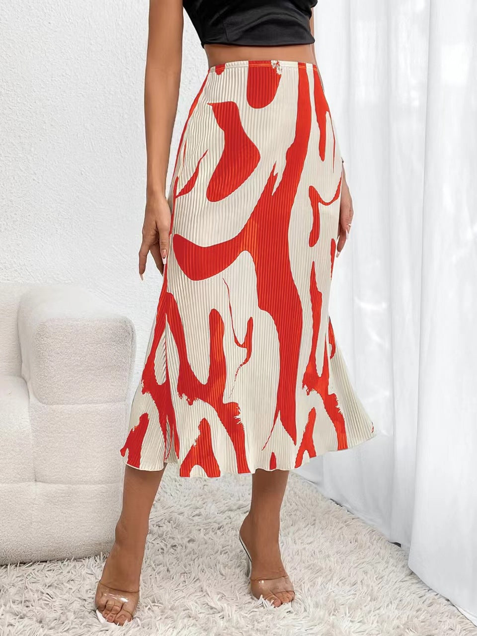 Women's zebra print pleated casual skirt with irregular hem and side slit by FitiqueFit, featuring a stylish and flowy design.