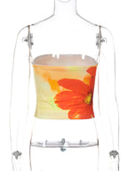 Floral print strapless tube top for women, bandeau style summer crop top by Trendsi, shown in vibrant floral design.