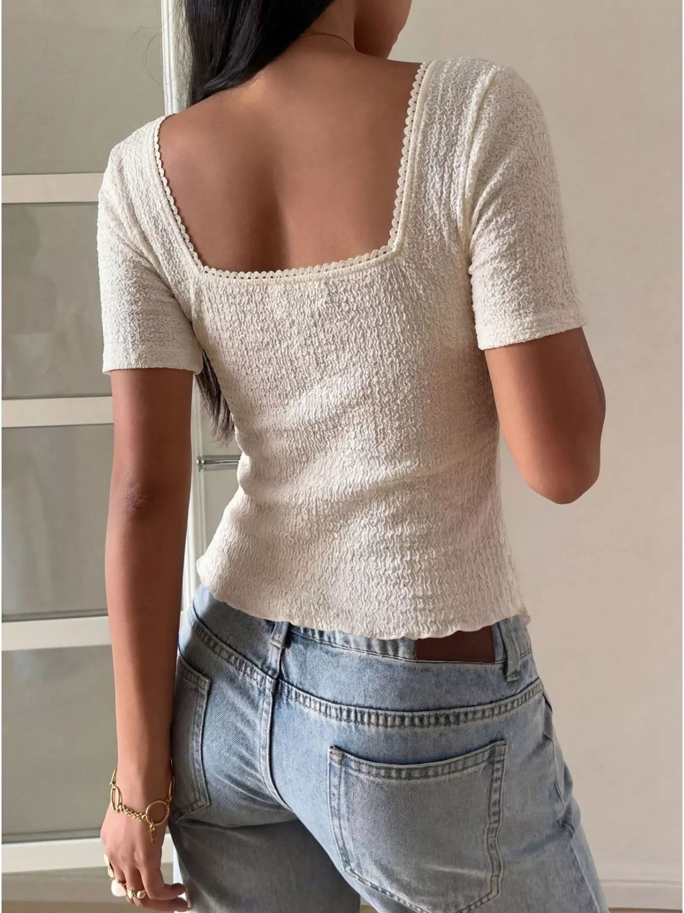 Sweetheart neck layered ruffle top by Trendsi showing the front view with ruffled details and a fitted silhouette.