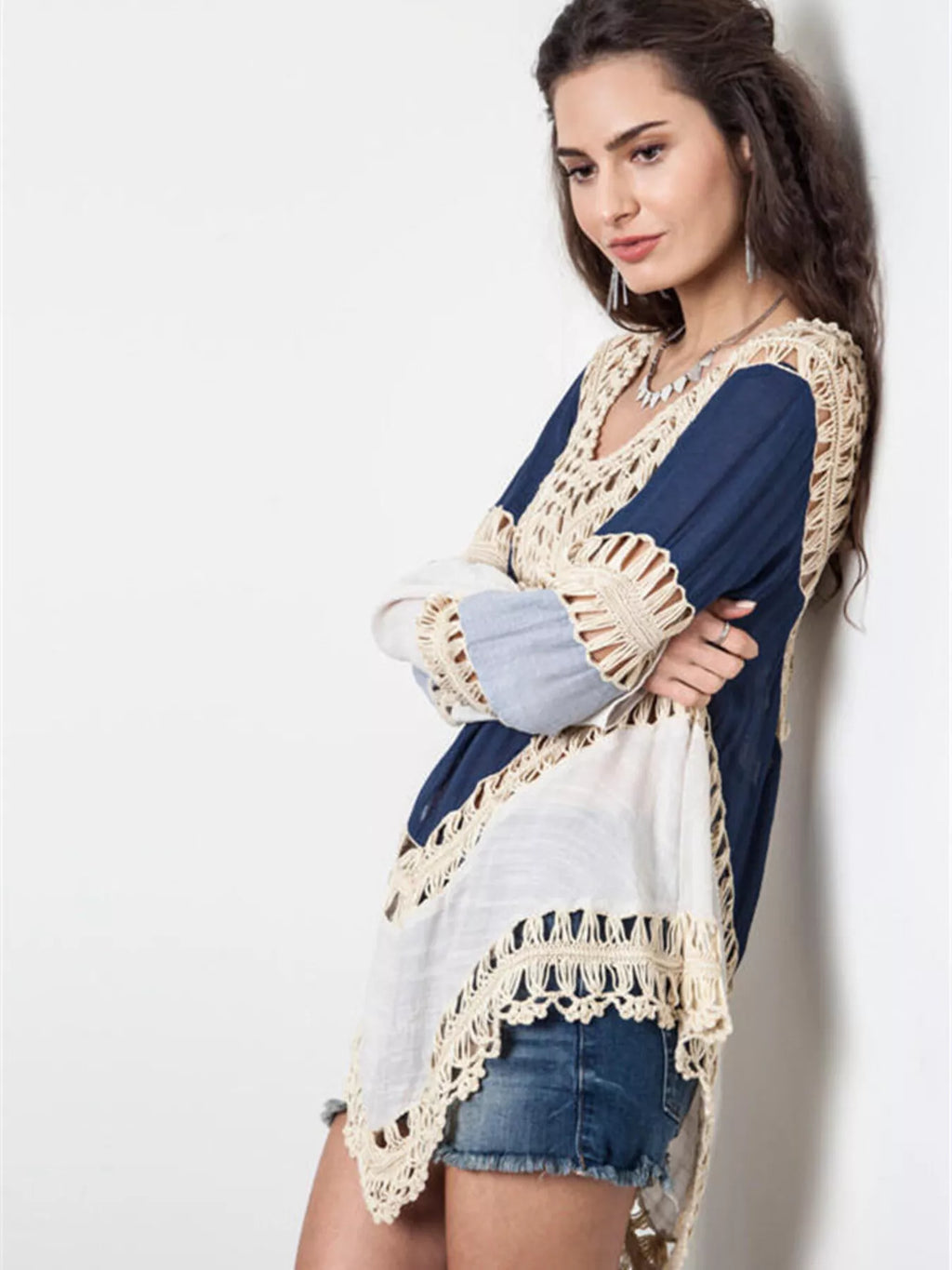 Crochet trimmed long sleeve cover-up by Trendsi featuring lightweight fabric and intricate crochet details for beachwear.