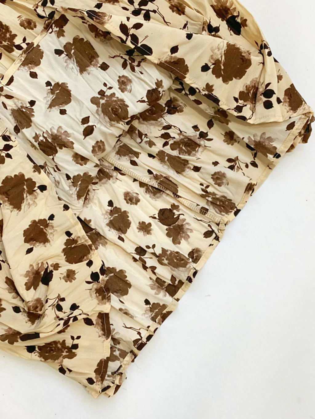 Floral print elastic waist midi skirt by Trendsi featuring a flowy design and vibrant flower pattern.