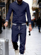 Men's plus size striped snap-down top and pants set by Trendsi, featuring a coordinated full-size casual clothing ensemble.