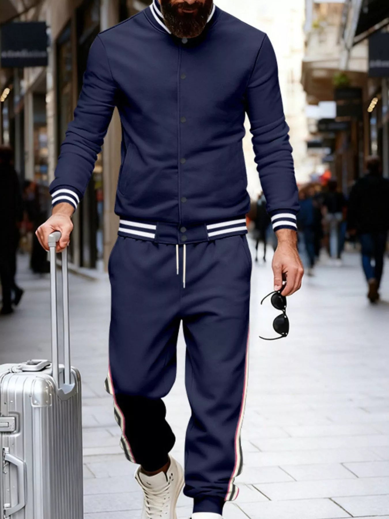 Men's plus size striped snap-down top and pants set by Trendsi, featuring a coordinated full-size casual clothing ensemble.