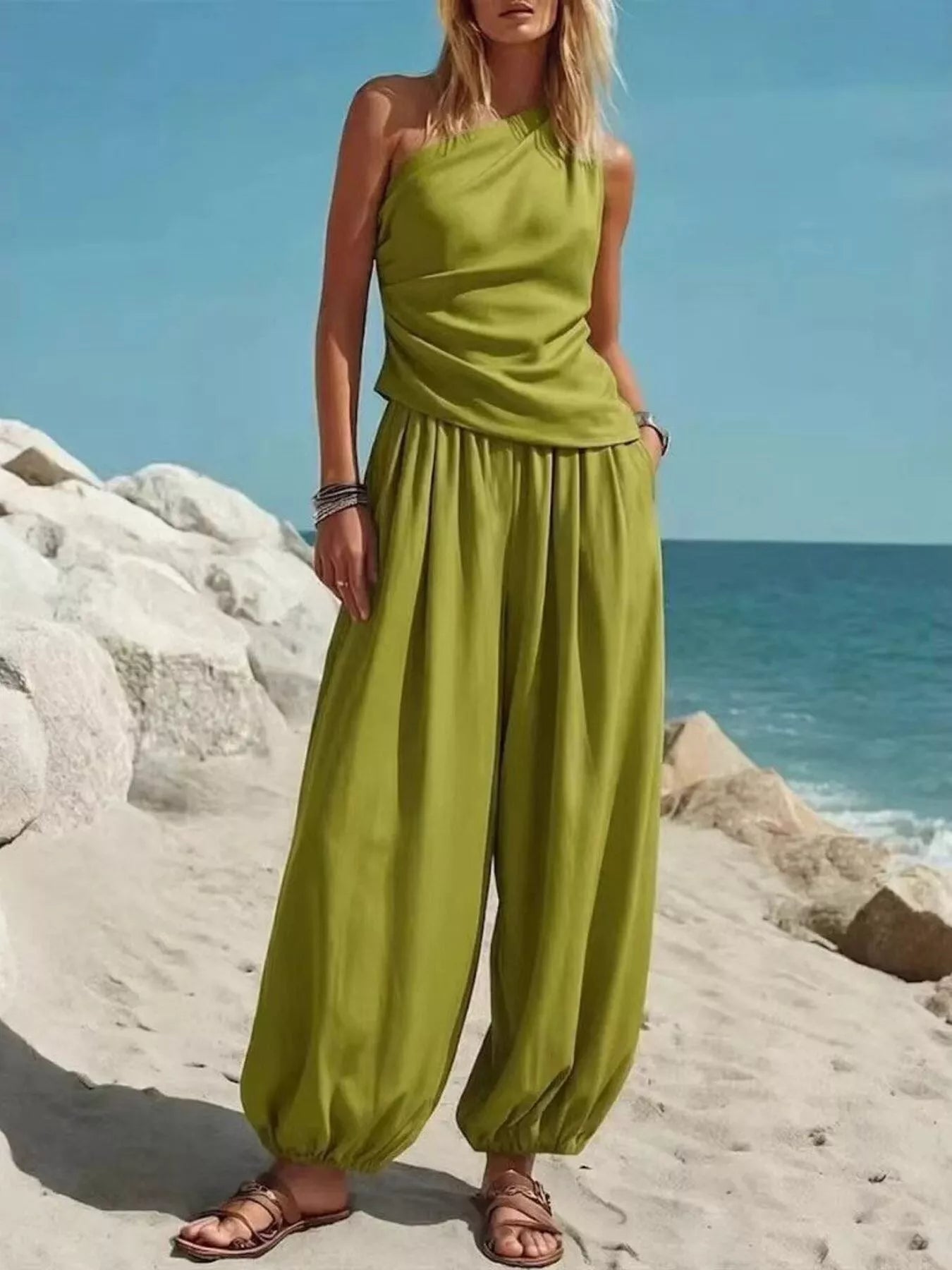 Plus size full size one-shoulder top and wide leg pants set by Plush Fashion Hub, featuring a stylish coordinated piece pants set.