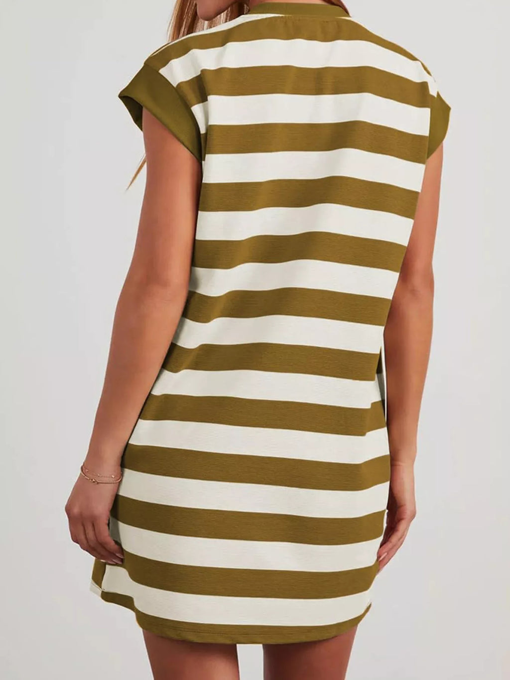 Plus size casual striped mini dress with short sleeves from Trendsi, featuring a relaxed fit and stylish design.