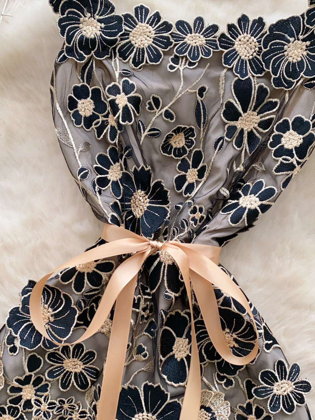 Floral embroidered tie waist mini dress by Trendsi featuring an elegant summer A-line silhouette.