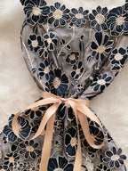 Floral embroidered tie waist mini dress by Trendsi featuring an elegant summer A-line silhouette.