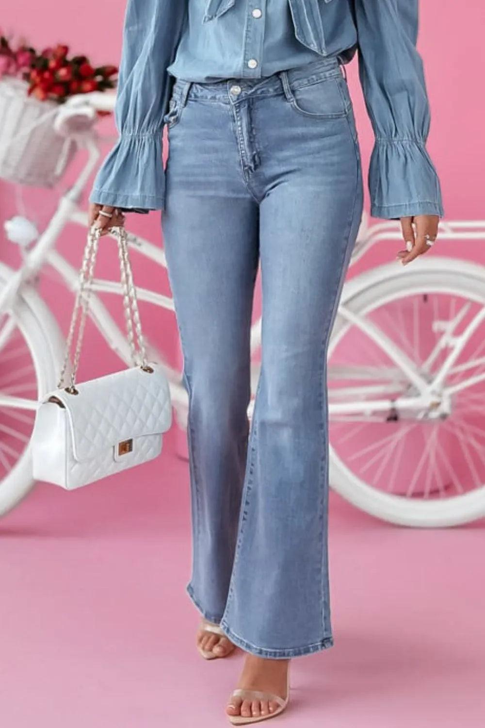 Trendsi bootcut jeans with front and back pockets, classic denim style, shown on a model.