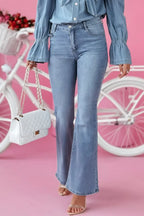 Trendsi bootcut jeans with front and back pockets, classic denim style, shown on a model.