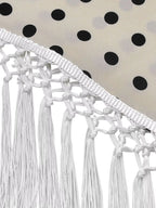 Polka dot halter neck cami and fringe trim pants set by Trendsi, featuring a stylish halter top and matching wide-leg pants.