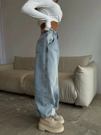 Plush Fashion Hub wide leg denim jeans with a relaxed fit and classic blue wash, displayed on a neutral background.