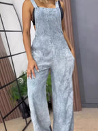 Full size wide-leg denim overalls from Trendsi, featuring a one-piece design with adjustable straps and classic denim fabric.
